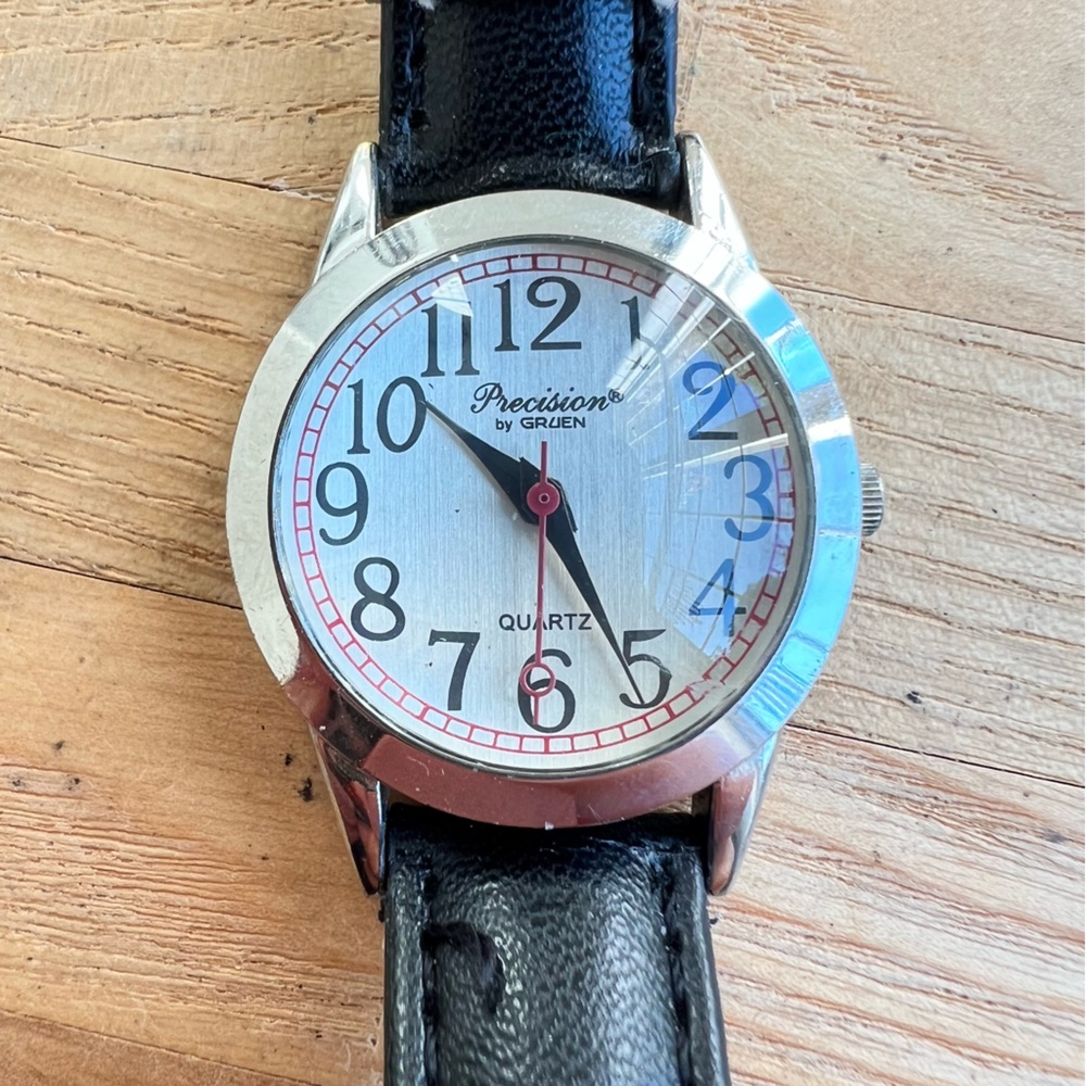 Precision by Gruen ladies silver tone black leather dress watch NEW BATTERY